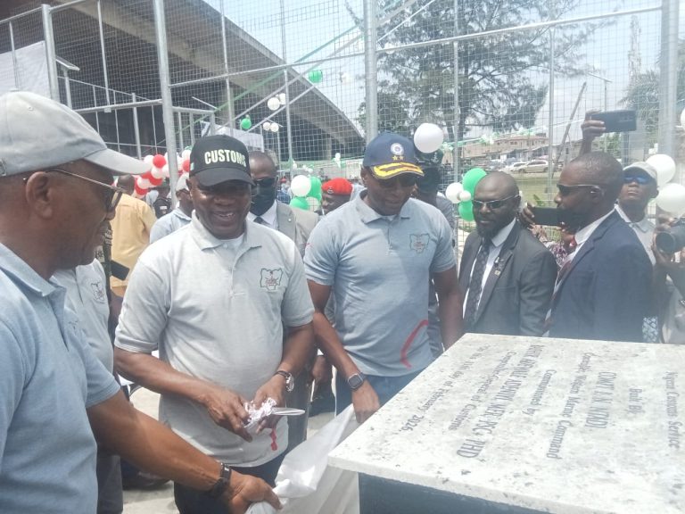 CUSTOMS CARES: CGC COMMISSIONS SPORTS ARENA BUILT BY WESTERN MARINE COMMAND